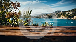 Wooden table with the background of the sea, an island and the blue sky.