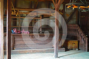 Wooden table for bar and the shelf on a wall.