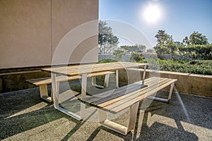 Wooden table with bench at a patio in Del Mar Southern California
