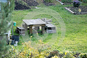 Wooden table and benches in the garden