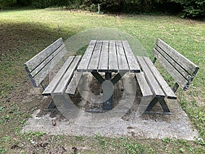 Wooden table and benches in the park. Picnic in the park.