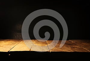 wooden table and blackboard background. Ready for product display montage