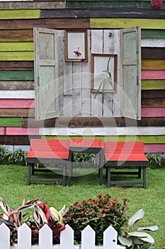 Wooden table and chairs in garden