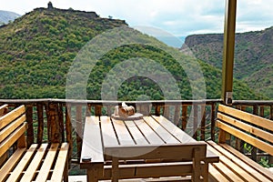 Wooden table and and chairs in the restaurant