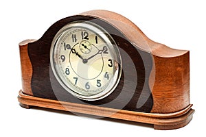 Wooden table clock on a white background