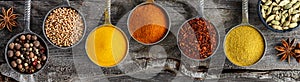 Wooden table of colorful spices