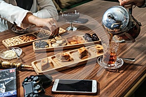 Wooden Table Displaying Assorted Food Trays
