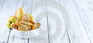 Wooden table with dried Pears (selective focus)