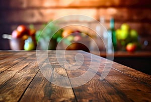 Wooden table in front of blurred background of the kitchen interior.