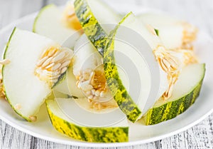 Wooden table with Futuro Melons & x28;selective focus& x29;