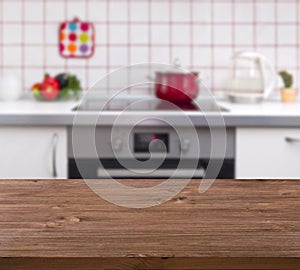 Wooden table on kitchen bench background