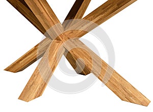 Wooden table legs isolated over white background, close view photo, crossed star shaped legs, wooden eco furniture elements