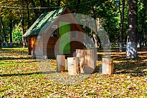 Wooden table made of a tree trunk sitting on a beautiful autumn landscape, Roman, Romania