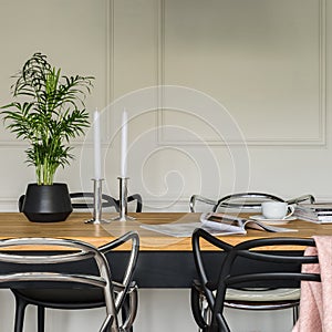 Wooden table and modern chairs
