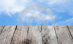 wooden table over blurred background for show your product on image