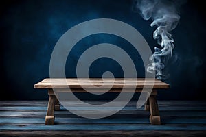 Wooden table that is for product montages. background of smokey dark blue