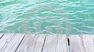 Wooden Table on Sea Blue Water Background at Coast View Nature Tropical Summer Lansdcape,Wave Ocean Beautiful for Tourism Relax