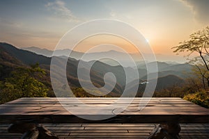 A wooden table set against a blurred, picturesque sunset mountain scene