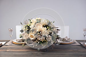 Wooden table setting and decoration for meal time, studio shot