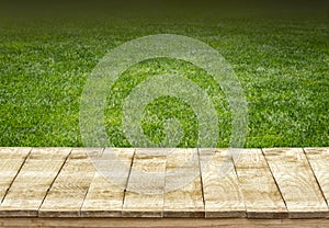 Wooden table and sports field