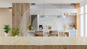 Wooden table top on blur kitchen room background,Modern Contemporary kitchen room interior