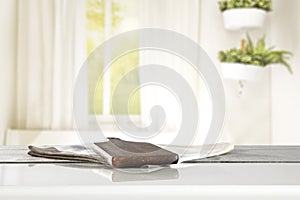 Wooden table top with cutting board and space for products.