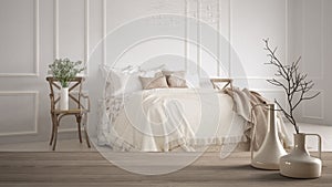 Wooden table top or shelf with minimalistic modern vases over blurred vintage classic bedroom with soft bed full of pillows and bl