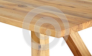Wooden table top surface isolated over white background. Solid wood furniture close view