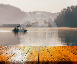 Wooden table and a view of the lake