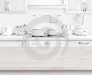 Wooden table on white modern kitchen interior background, pastel colors