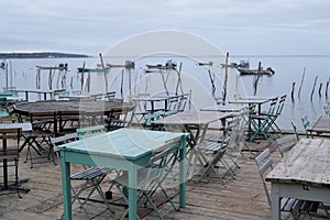 Wooden table winter terrace seafood oysters tasting on l`herbe village Beach in Cap Ferret Arcachon bay France