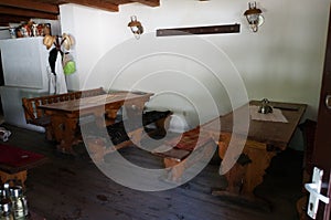 Wooden tables and bench on terrace photo