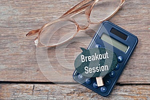 Wooden tag written with text BREAKOUT SESSION. Selective focus