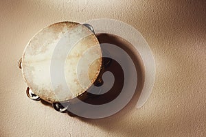 Wooden Tambourine on Wall