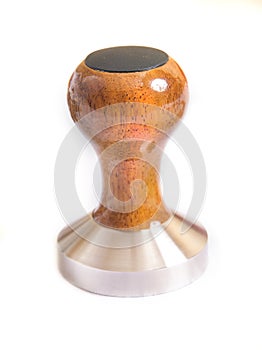 Wooden tamper with metallic working surface