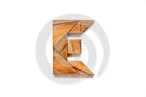 Wooden tangram puzzle as English alphabet letter E