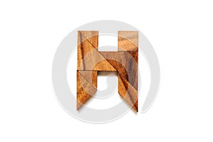 Wooden tangram puzzle as English alphabet letter H