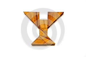 Wooden tangram puzzle as English alphabet letter Y