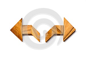 Wooden tangram puzzle in directioinal arrow shape