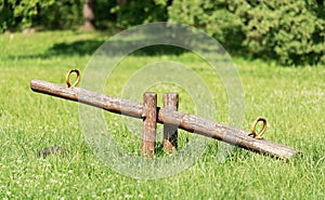 Wooden teeter in park