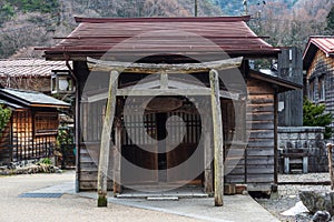 wooden temple with torii gate of Narai-juku, Kiso valley