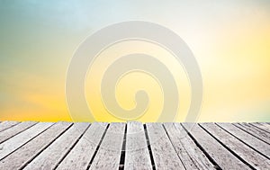 Wooden terrace the blurred and Christmas background concept. Wood white table top perspective in front of natural in the sky with