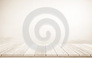 Wooden terrace the blurred and Christmas background concept. Wood white table top perspective in front of natural in the sky with