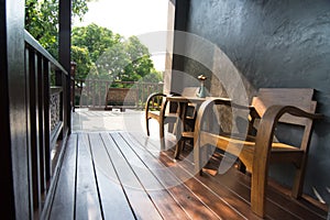 Wooden terrace and classic chair for background usage