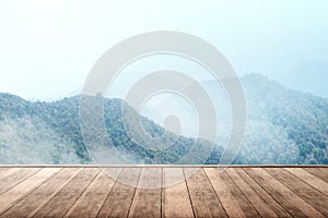 Wooden terrace with top of the mountain view