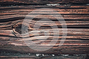 Wooden texture, background from brown old logs. photo