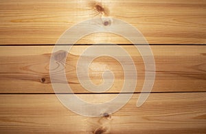 Wooden texture background, pine board, spruce table with knots. Horizontal banner. Top view light wood textured surface with