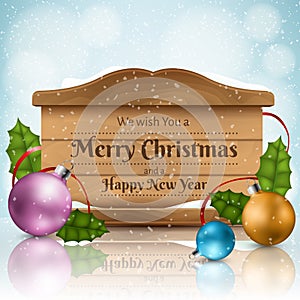 Wooden texture frame for Christmas with colorful balls, holly leaf and snowfall