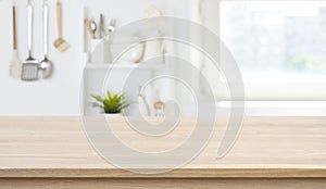 Wooden texture table top on blurred kitchen window background