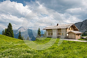 Wooden timber chalet house on austrian mountains